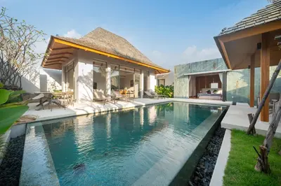 a swimming pool in the backyard of a villa at Thai-Balinese Pool Villa Anchan Indigo16 in Ban Phru Champa