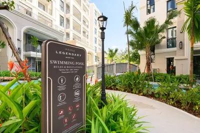 a sign in front of a building with a street light at Bangtao The Title Legendary by Phuket Sabay Rent F701 in Bang Tao Beach
