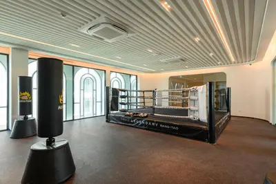a large room with a couple of boxing equipment at Bangtao The Title Legendary by Phuket Sabay Rent F511 in Bang Tao Beach