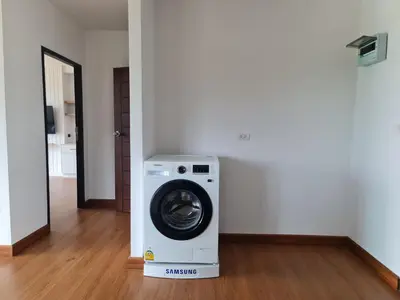 a washing machine in the middle of a room at BP Sweet Home Bang Tao - 607 in Ban Thalat Choeng Thale