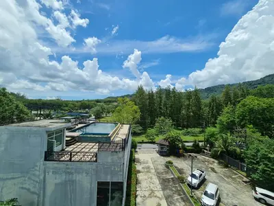 an aerial view of a house with a swimming pool at BP Sweet Home Bang Tao - Studio in Ban Thalat Choeng Thale