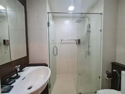 a bathroom with a sink and a shower at BP Sweet Home Bang Tao - Studio in Ban Thalat Choeng Thale