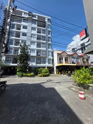 a large apartment building in the middle of a street at Tower2 Condominium in Ban Klang