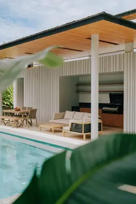 a house with a pool and a bed and a piano at Botanica Foresta B09 in Ban Phru Champa