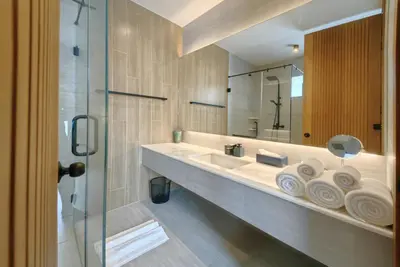 a bathroom with a sink and a mirror at Bangtao Luxury Pool Villa - PrymaSelva in Laguna Phuket
