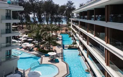 an aerial view of the pool at the resort at Sunshine Beach Appartments, 2BD in Layan Beach