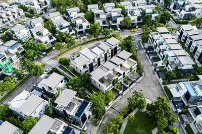 an aerial view of a city with houses at Villa Laguna Park in Ban Thalat Choeng Thale