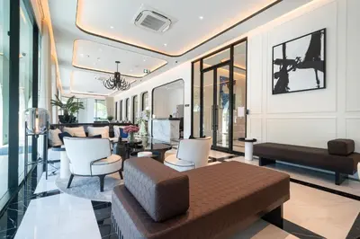 a living room with a couch and chairs at The Title Legendary D-605 1 BR Bangtao Beach in Bang Tao Beach