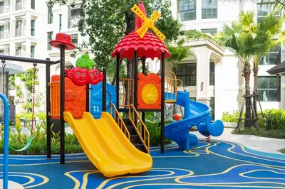 a playground with a slide in a park at The Title Legendary D-605 1 BR Bangtao Beach in Bang Tao Beach