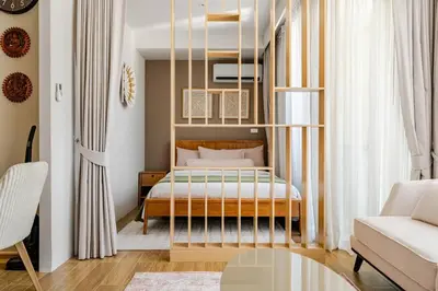 a bedroom with a bed in a room at Beachside by Villacarte in Bang Tao Beach