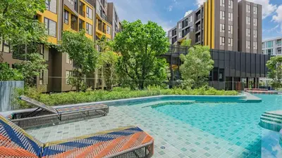 an image of a swimming pool in a building at 1 Bedroom close to Central Shopping Mall in Ban Rangeng