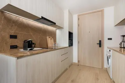 a kitchen with a counter with a coffee maker at Ozone condominium Bang Tao by My Home Phuket in Laguna Phuket
