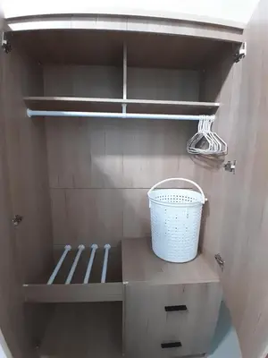 a cupboard with a bucket on top of it at Baan Saun PK in Ban Bang La