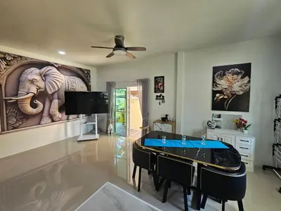 a living room with a ping pong table at 2 Bedrooms Tropical Pool Villa Rawai in Rawai Beach