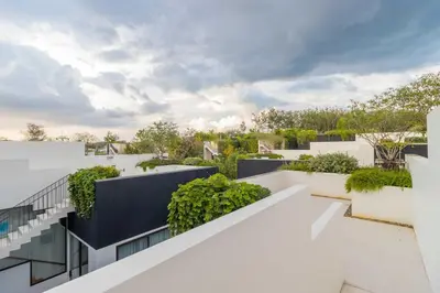 an exterior view of a building with plants at V275 Stay with Nature 2BR Peaceful Pool Villa in Ban Pak Lak