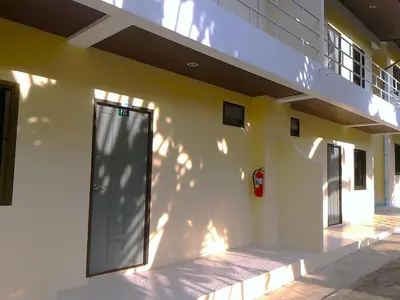 a building with a door on the side of it at Baan-kawkaew-kata in Karon Beach