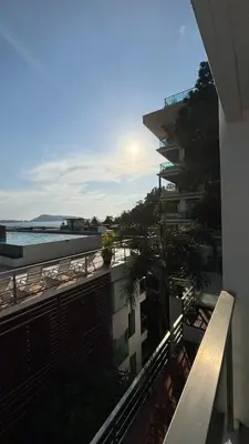 a balcony of a building with a view of the ocean at 3 Beds patong baycleef residence in Patong Beach