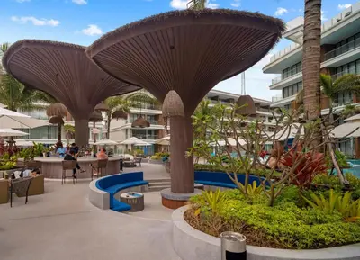 a resort with two large mushroom like structures at Kora Beachfront 240 One Bedroom Apartment Phuket in Phuket Town