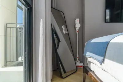 a hospital room with a bed and a window at The Title Legendary White Reef 2BR in Bang Tao Beach