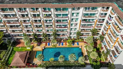 an aerial view of an apartment building with a swimming pool at OMNIAPhuket - 2 Bedrooms Flat - Pool View - Gym in Patong Beach