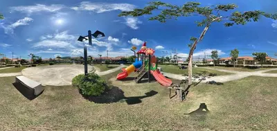 a playground with a slide in a park at Holiday home in Ban Na Khua