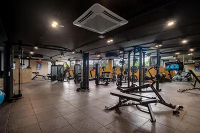 a gym with a bunch of treadmills and machines at Premier Pool View Studio 348 Kora Resort in Phuket Town