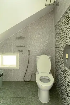 a bathroom with a toilet and a shower at The Garden Escape Villa, Private Tropical Hideaway in Rawai Beach