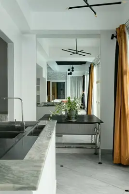 a kitchen with a counter top and a sink at The Garden Escape Villa, Private Tropical Hideaway in Rawai Beach