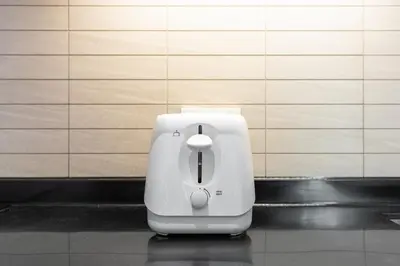 a white appliance sitting on the floor in a room at Porto 1BR Pool Access Suite at Title Legendary in Bang Tao Beach