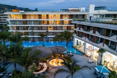 an overhead view of a hotel with a swimming pool at KORA 2BR LUXURY POOL VIEW Apartment in Layan Beach