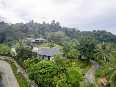 an aerial view of a house on a hill at B204 Banjong Studio 3 Minutes To Nai Harn Beach in Rawai Beach