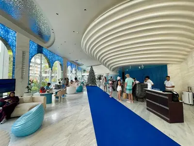 a rendering of the lobby of a shopping mall at Kora Beach 2Bdr 150 m to the Beach in Layan Beach