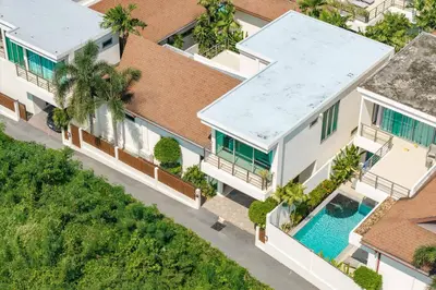 an aerial view of a house with a swimming pool at Tropical Rawai Beach Home Retreat with Pool & Gym in Rawai Beach
