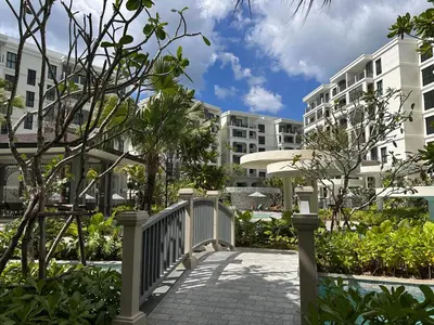 a walkway in front of apartment buildings at 1BR Apartment near Bang-Tao Beach CapitalPro TLB-H206 in Bang Tao Beach