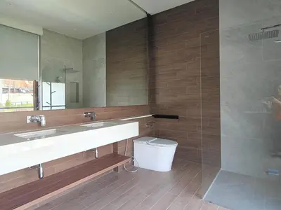 a bathroom with two sinks and a shower at Aileen Layan Villa 3 Private Pool 4 Bedroom in Phuket Town