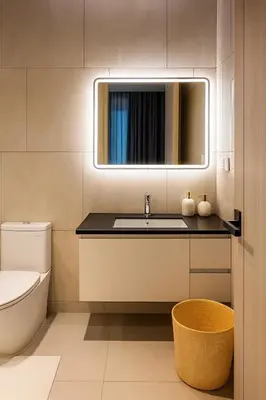 a bathroom with a sink and a mirror at Apartment at the brand new Title Legendary by Lofty in Bang Tao Beach