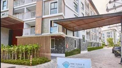 a building with a sign in front of it at Comfortable Relax at Rawai Title in Ban Saiyuan (1)