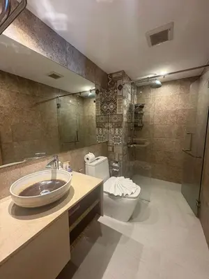 a bathroom with a sink and a toilet at Comfortable Relax at Rawai Title in Ban Saiyuan (1)