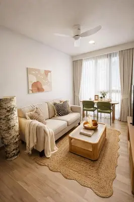 a living room with a couch and a table at New 1BR Condo, walk to Bang Tao Beach in Laguna Phuket