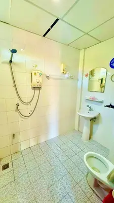 a bathroom with a shower and a toilet and a sink at For 3 Person in Central Pa Tong, Thailand in Patong Beach
