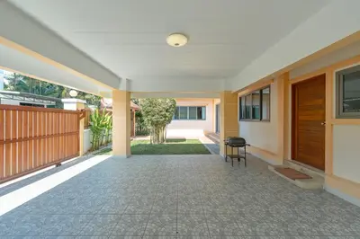 an empty hallway of a house with a porch at Orchid Pool Villa 8 Rawai in Rawai Beach