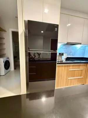 a kitchen with white cabinets and a counter top at Luxury 112 m 2BR, Direct Pool Access, 1st Line, Klong Muang Beach in Ban Ko Kwang