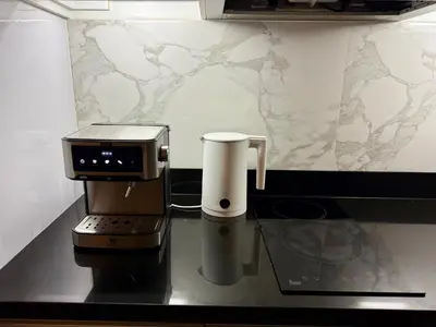 a coffee maker sitting on top of a counter at Luxury 112 m 2BR, Direct Pool Access, 1st Line, Klong Muang Beach in Ban Ko Kwang