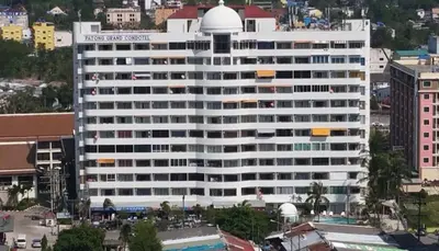 a large white building with a dome on top of it at Lahan 4 in Patong Beach