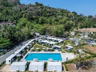 an aerial view of a resort with a pool at Bangtao Apple House Peace by the Sea in Ban Lum Fuang