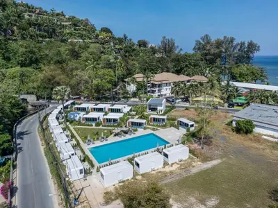 an aerial view of a resort with a swimming pool at Apple House Bangtao with Pool & Terrace, beach in Ban Lum Fuang