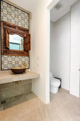 a bathroom with a sink and a toilet at Sarah Place Private Tropical Villa in Ban Pak Lak