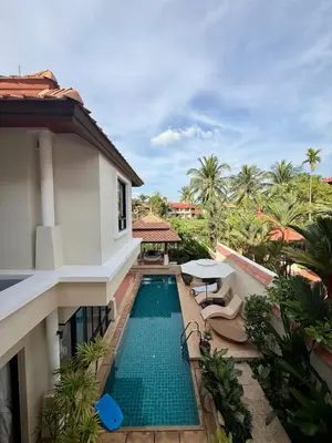 a view of the pool from the balcony of a villa at Tropical Thai style 4 bedroom pool villa in Laguna Phuket