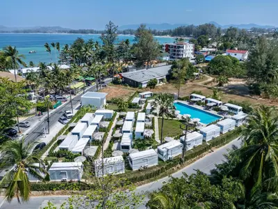 an aerial view of a resort with a pool at Apple House Phuket Pool, Terrace, Breakfast, Beach in Ban Lum Fuang