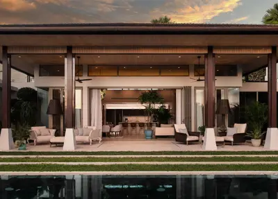 a house with a pool in front of it at Luxury Botanica Villa in Ban Phru Champa